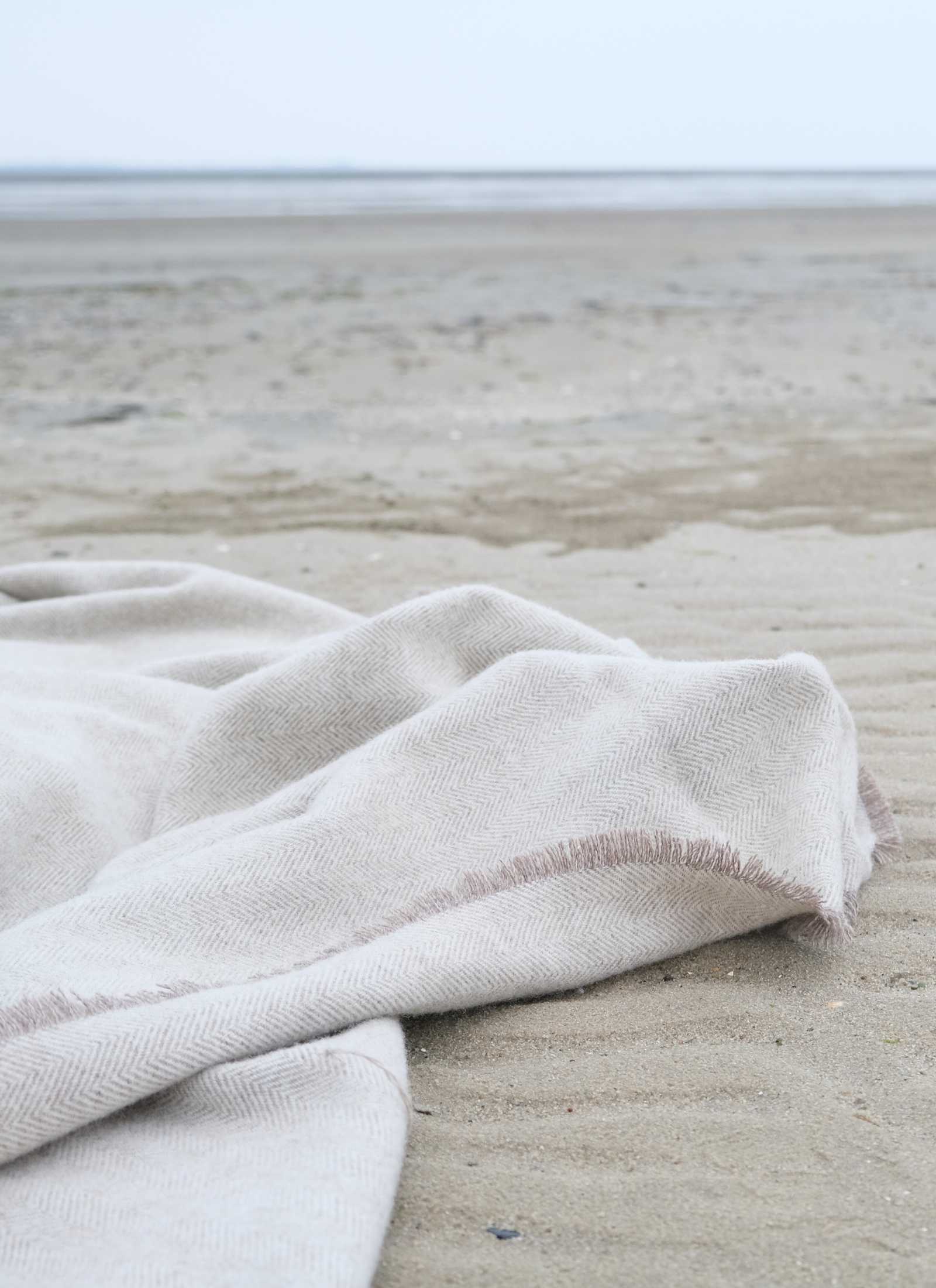FishBoneDyke Wolldecke am Strand im Watt